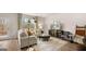 Well-lit living room with a plush sofa, decorative lighting, and stylish furnishings at 326 Sound Cir # 119, Stockbridge, GA 30281