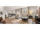 Cozy living room with an open floor plan, comfortable seating, and modern decor at 326 Sound Cir # 119, Stockbridge, GA 30281