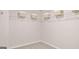 Walk-in closet with carpet flooring featuring a wire shelf with storage baskets at 326 Sound Cir # 119, Stockbridge, GA 30281