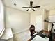 Neutral bedroom with a ceiling fan and a window at 4438 Encore Park Xing, Duluth, GA 30097