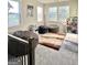 Bright bonus room with multiple windows, carpet, a games display shelf, and room for many beanbag chairs at 4438 Encore Park Xing, Duluth, GA 30097