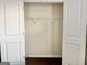 Spacious closet with white doors and a hanging rack at 4438 Encore Park Xing, Duluth, GA 30097
