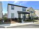 Charming two-story home featuring a covered porch and a well-maintained, landscaped front yard at 4438 Encore Park Xing, Duluth, GA 30097