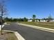 Street view of a community with green spaces and well-maintained landscaping at 4438 Encore Park Xing, Duluth, GA 30097
