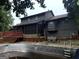 Backyard featuring a patio, wooden deck, and an empty in-ground swimming pool at 275 Summertown Dr, Stockbridge, GA 30281