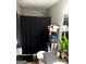 Bathroom featuring a shower, toilet, and storage shelves for toiletries and essentials at 275 Summertown Dr, Stockbridge, GA 30281