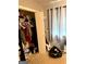 Well-utilized closet with varied storage and organized attire, maximizing space efficiency at 275 Summertown Dr, Stockbridge, GA 30281