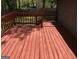 Wooden deck with railings and stairs leading to the backyard at 275 Summertown Dr, Stockbridge, GA 30281