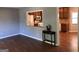 Bright and airy living room with a view into the kitchen and adjoining spaces at 275 Summertown Dr, Stockbridge, GA 30281