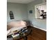 Cozy living room featuring hardwood floors and an open view into the kitchen at 275 Summertown Dr, Stockbridge, GA 30281
