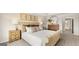 Comfortable bedroom featuring neutral decor, carpet, a large bed and dual nightstands at 334 Sound Cir # 120, Stockbridge, GA 30281