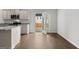 Kitchen with granite countertops, stainless steel appliances, and hardwood floors at 334 Sound Cir # 120, Stockbridge, GA 30281
