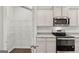 A kitchen featuring stainless steel appliances, granite countertops and a pantry at 334 Sound Cir # 120, Stockbridge, GA 30281
