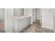 Bright bathroom featuring a double sink vanity with white cabinets and a modern shower at 334 Sound Cir, Stockbridge, GA 30281