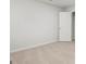 Bright bedroom featuring neutral carpet, a door, and base trim detail at 334 Sound Cir, Stockbridge, GA 30281