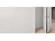 Bright closet featuring neutral carpet, a door, and base trim detail at 334 Sound Cir, Stockbridge, GA 30281