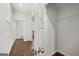Walk-in closet with shelving and hardwood floors, offering ample storage space at 334 Sound Cir, Stockbridge, GA 30281