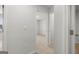 Hallway featuring neutral carpet and white doors at 334 Sound Cir, Stockbridge, GA 30281