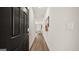 View from front door down hallway with hardwood floors at 334 Sound Cir, Stockbridge, GA 30281