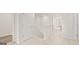 Hallway with carpeted floor and view to rooms at 334 Sound Cir, Stockbridge, GA 30281