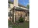 Backyard featuring a charming pergola with lattice accents, adding a touch of elegance to the outdoor space at 117 Rendition Dr, Mcdonough, GA 30253