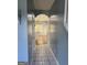Inviting hallway with tile flooring leading into a bright and airy living space at 117 Rendition Dr, Mcdonough, GA 30253