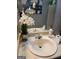 Bathroom sink with decorative flowers, mirror, and vanity offering a simple, functional space at 2443 Shoals Ter, Decatur, GA 30034