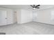 Spacious main bedroom with neutral carpeting, ample natural light, and a ceiling fan at 3353 Arabian Farm Ln, Dacula, GA 30019
