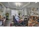 Formal dining room with a tray ceiling, and stylish furnishings at 5845 Princeton Run Trl, Tucker, GA 30084