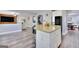 Kitchen island with an open view to the living room and dining area at 5845 Princeton Run Trl, Tucker, GA 30084