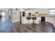 Bright kitchen with white cabinetry, stainless steel appliances, and center island with barstool seating at 5845 Princeton Run Trl, Tucker, GA 30084