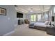 The main bedroom features tray ceilings, recessed lighting, and a sitting area at 5845 Princeton Run Trl, Tucker, GA 30084