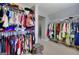 Spacious walk-in closet with ample storage and shelving for clothes and accessories, great for organization at 5845 Princeton Run Trl, Tucker, GA 30084