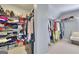 Spacious walk-in closet with ample storage, shelving, and organized hanging space at 5845 Princeton Run Trl, Tucker, GA 30084