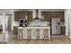 Modern kitchen with an island, stainless steel appliances, and stylish cabinetry at 791 Grande Bishop Dr, Fairburn, GA 30213