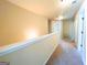 Neutral carpeted hallway at 104 Beautiful Way Lot 48 # 48, Locust Grove, GA 30248