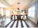 Bright living room with stylish decor and ample natural light from the large window at 104 Beautiful Way Lot 48 # 48, Locust Grove, GA 30248