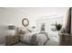 Cozy bedroom with ample natural light, stylish decor, and comfortable furnishings at 2278 Santa Fe St, Morrow, GA 30260