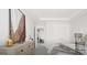 Serene bedroom showcasing a dresser, large painting, and a comfortable bed at 2278 Santa Fe St, Morrow, GA 30260
