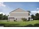 Side view of a two-story home with gray siding and a well-maintained lawn at 2278 Santa Fe St, Morrow, GA 30260