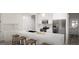 Bright modern kitchen with stainless steel appliances and spacious island at 2278 Santa Fe St, Morrow, GA 30260