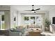 Bright living room with large windows, comfortable seating, and modern décor at 2278 Santa Fe St, Morrow, GA 30260