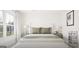 Charming main bedroom with decorative lamps, side tables, and a comfortable bed at 2278 Santa Fe St, Morrow, GA 30260