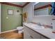 Bathroom featuring vanity with mirror, toilet, and decor at 2000 Campbell Rd, Covington, GA 30014