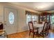 Cozy dining room with hardwood floors, traditional furniture, and abundant natural light at 2000 Campbell Rd, Covington, GA 30014