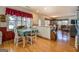 Cozy kitchen with a breakfast nook, natural light, and wood floors at 2000 Campbell Rd, Covington, GA 30014