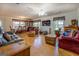 Large living room with wood floors and bright natural light at 2000 Campbell Rd, Covington, GA 30014