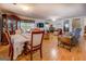 Living room with fireplace, television, and wood floors at 2000 Campbell Rd, Covington, GA 30014