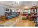 Spacious living room featuring a comfortable seating arrangement and an open floor plan at 2000 Campbell Rd, Covington, GA 30014
