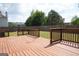 View of the wooden deck, showcasing the outdoor living space and backyard at 65 Heaton Place Trl, Covington, GA 30016